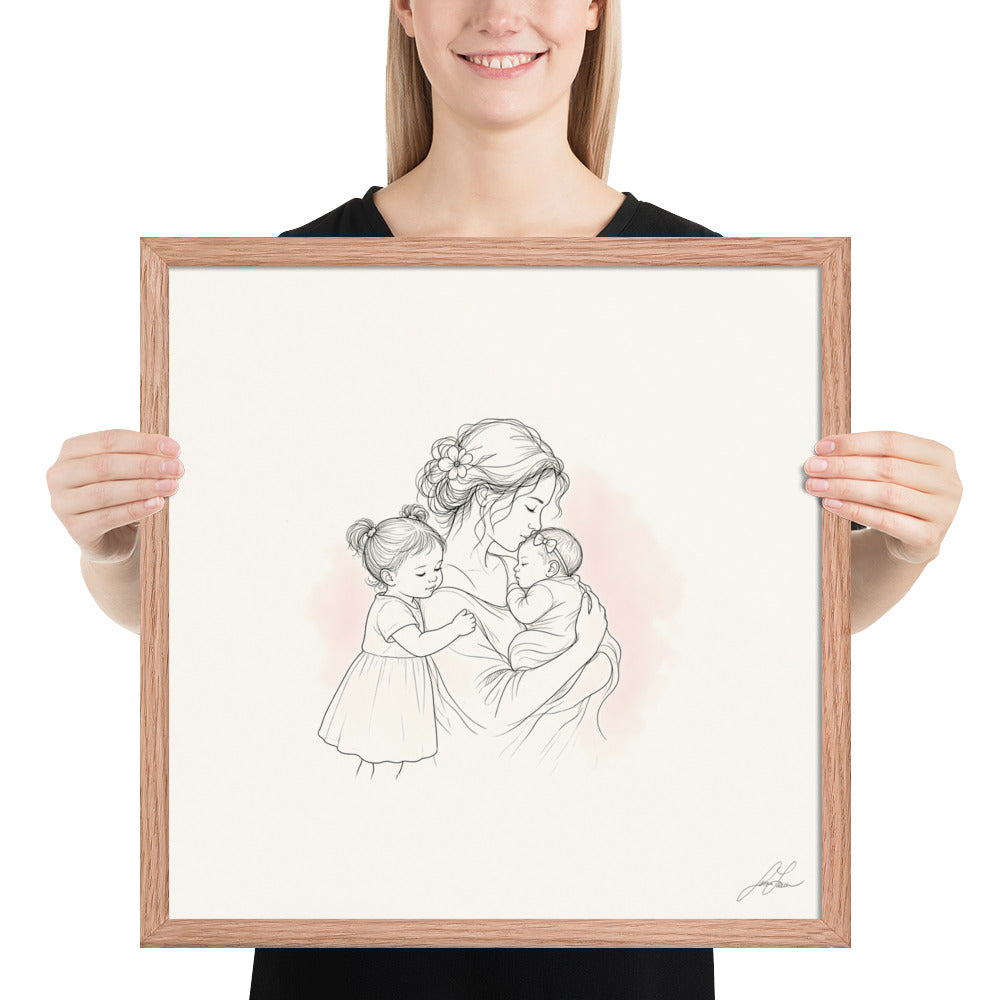 Room in My Heart, a fine-line drawing of a mother holding her baby girl with a little sister at her side, Beloved print by Jamie Lawrence in a Red Oak frame, held to show scale