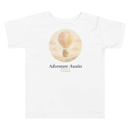 Adventure Awaits Toddler Tee laid flat with gold JL Gallery mark